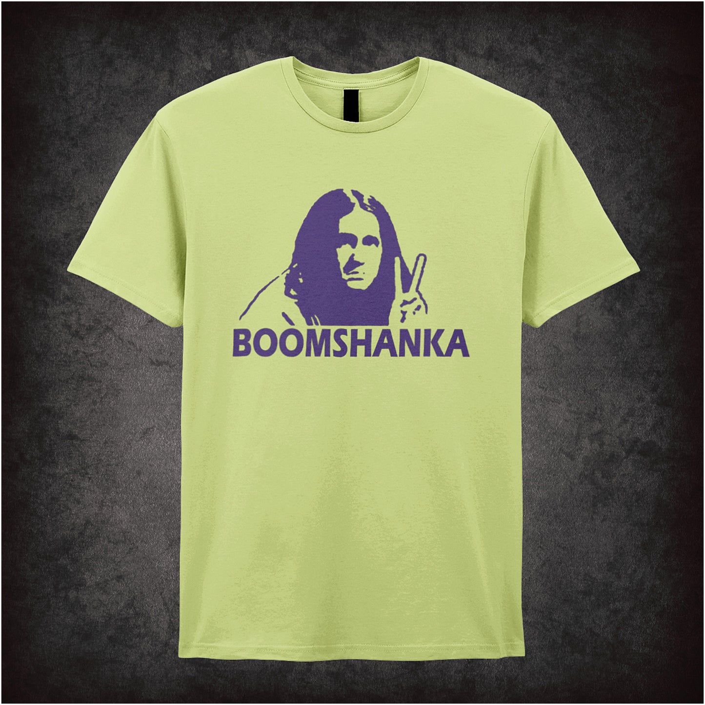 pistachio soft style unisex T-shirt featuring the word "Boomshanka" in bold lettering, inspired by classic British sitcom The Young Ones.