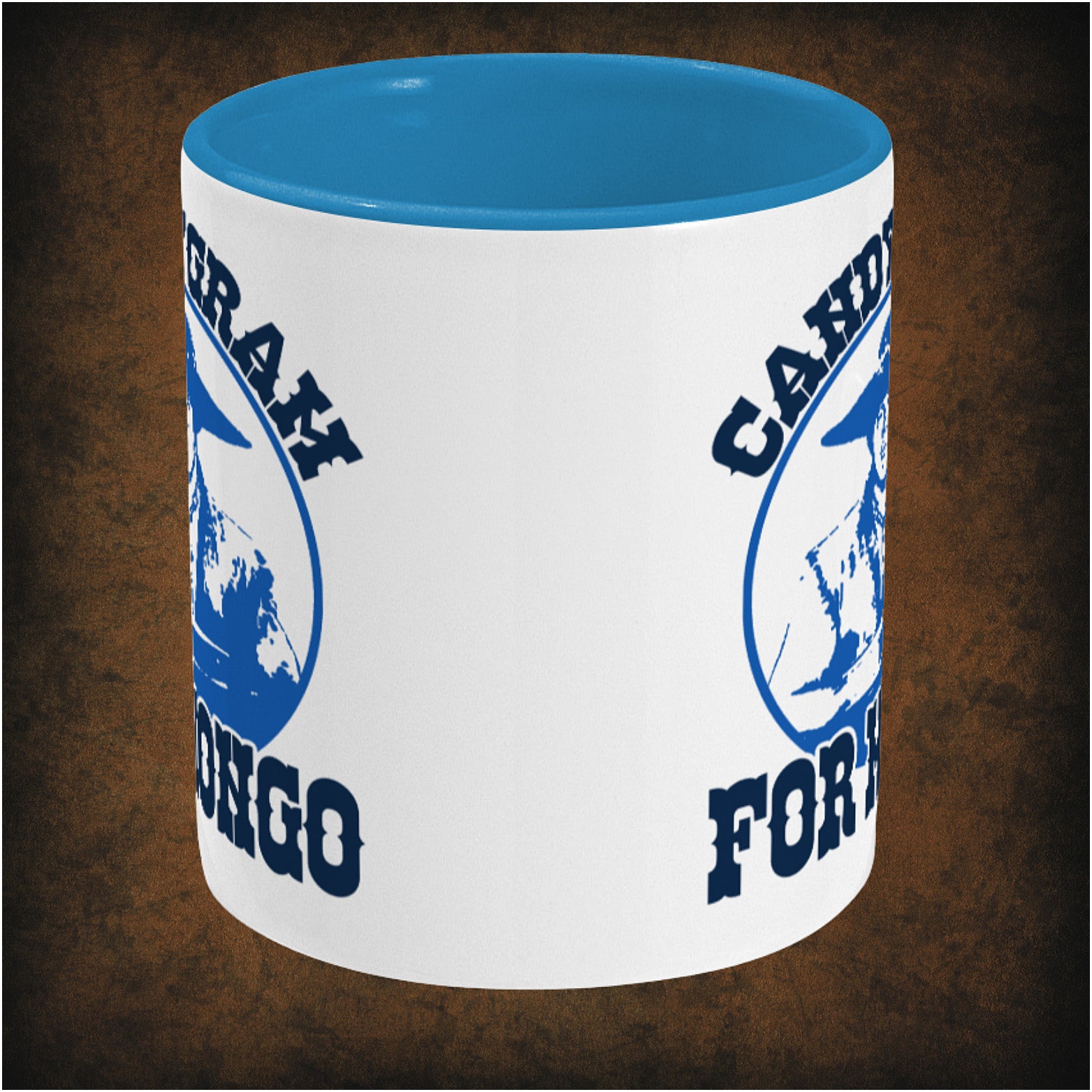 Two-tone ceramic mug featuring 'Candygram for Mongo' design inspired by Blazing Saddles, wrap-around print, center dishwasher and microwave safe comedy mug.