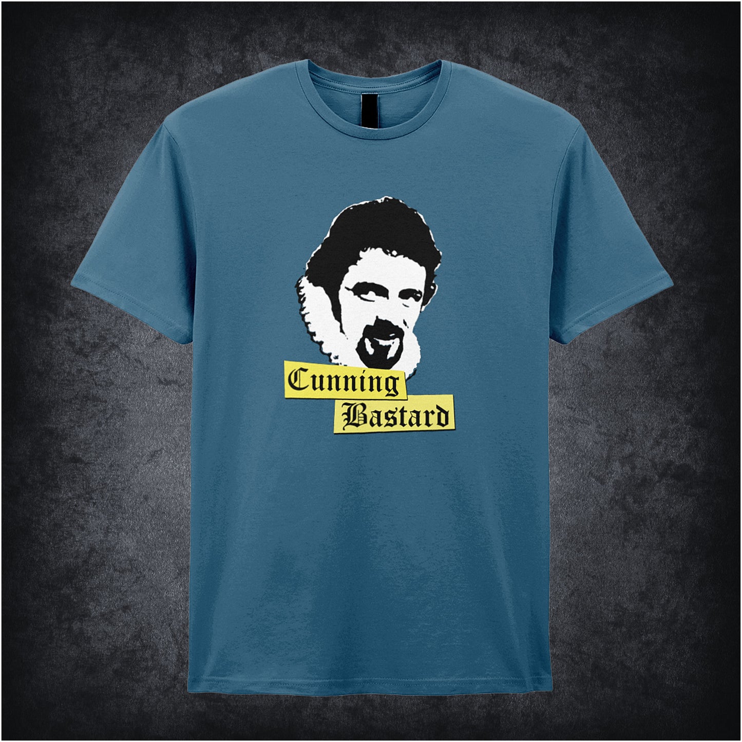 indigo unisex T-shirt featuring the phrase “Cunning Bastard” inspired by Blackadder, displayed in bold, classic serif typography.