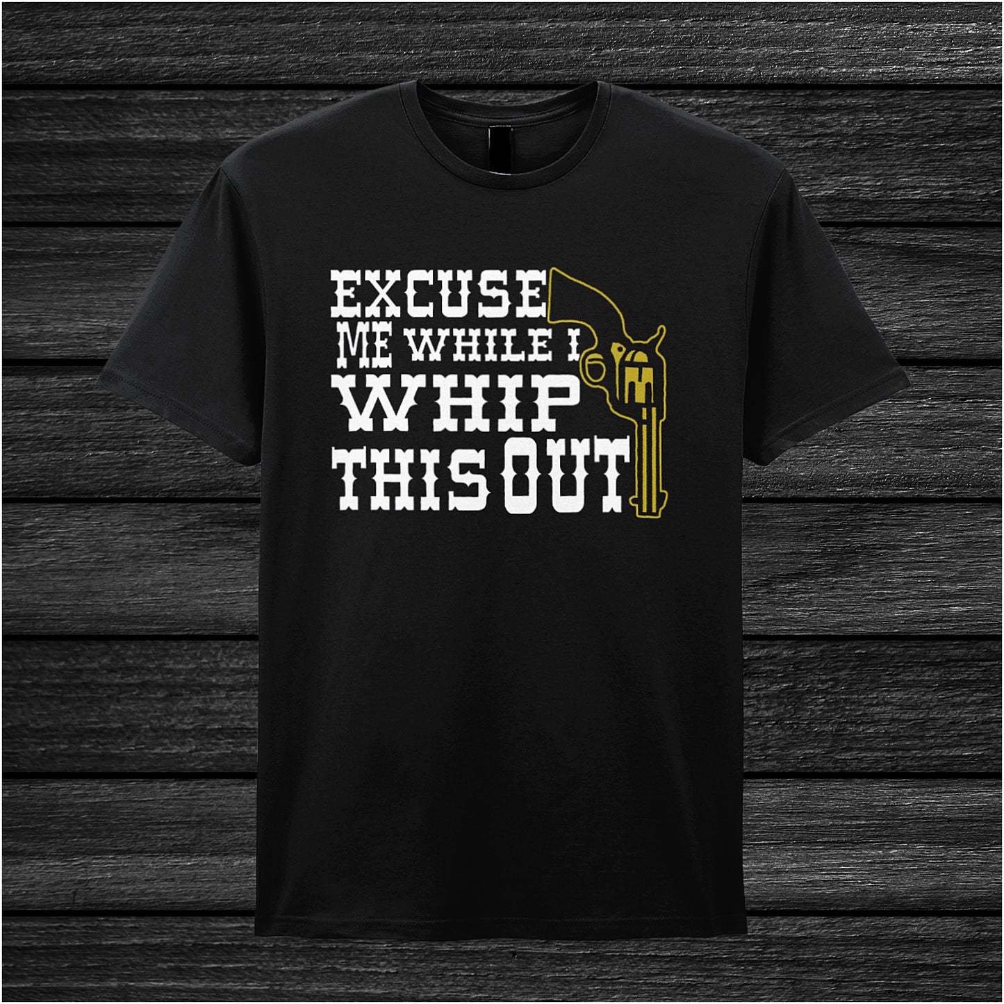 Black unisex t-shirt featuring the phrase “Excuse Me While I Whip This Out” in bold lettering, inspired by the movie Blazing Saddles.