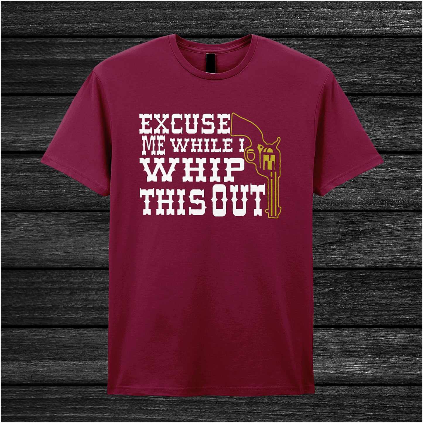 cardinal red unisex t-shirt featuring the phrase “Excuse Me While I Whip This Out” in bold lettering, inspired by the movie Blazing Saddles.