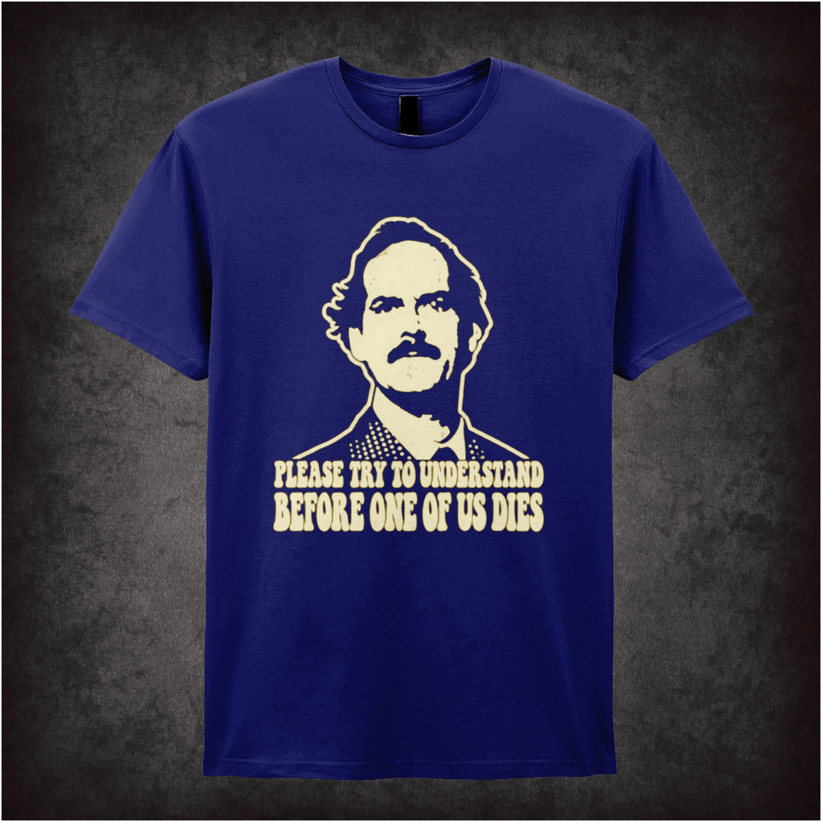 “Basil Fawlty ‘Please try to understand before one of us dies’ T-shirt in navy from Fawlty Towers”
