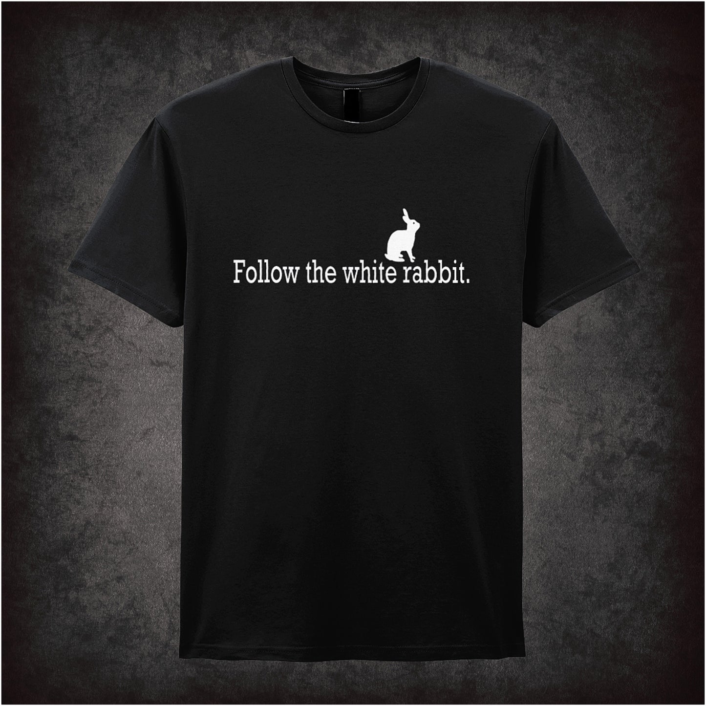 Black unisex T-shirt featuring the phrase “Follow The White Rabbit” inspired by The Matrix, displayed in sleek white typography with a minimalist design.