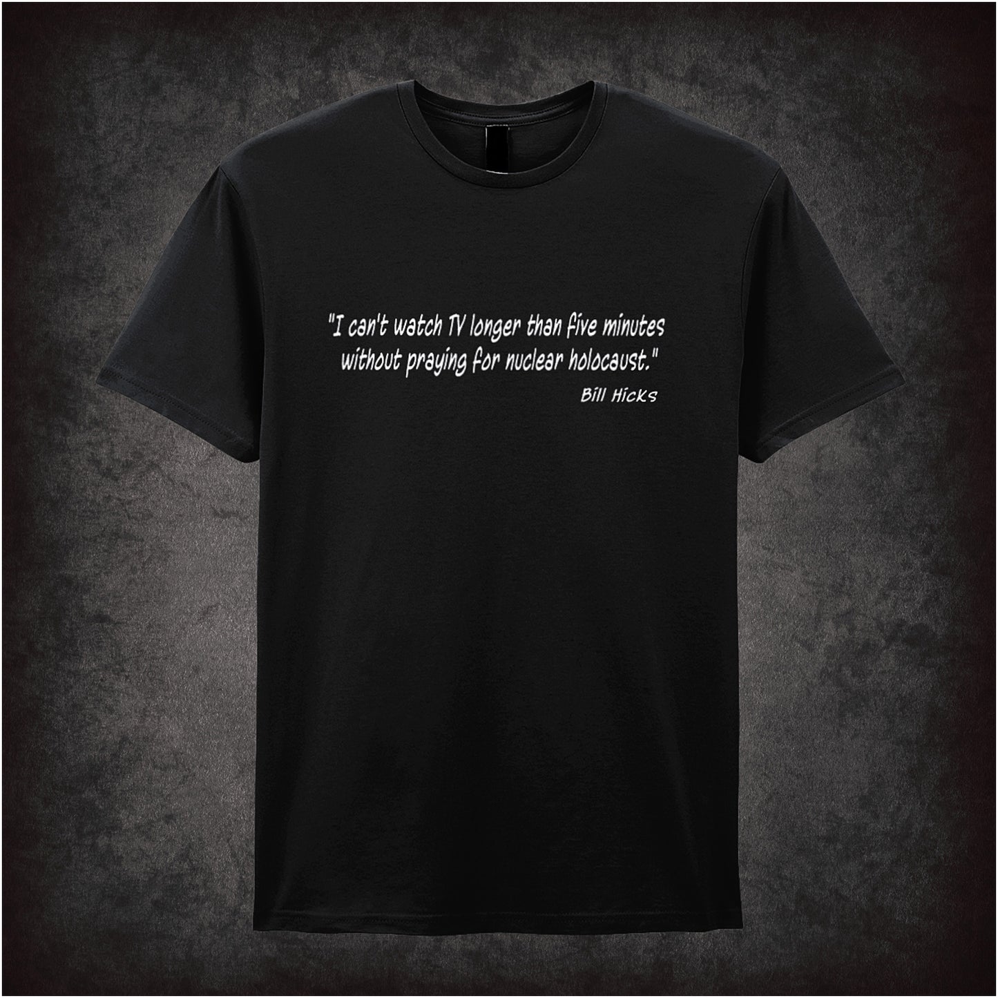 Black unisex t-shirt featuring the Bill Hicks quote "I Can't Watch TV Longer Than Five Minutes Without Praying For Nuclear Holocaust" in bold, white lettering.