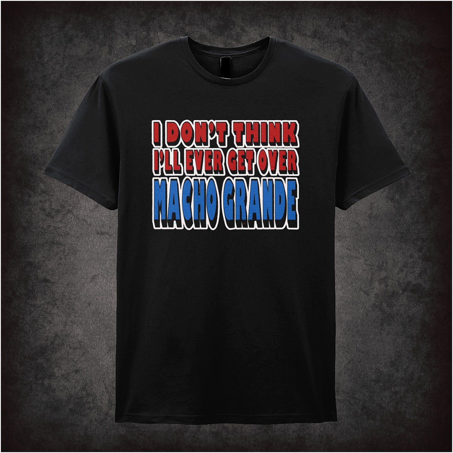black unisex T-shirt featuring the quote “I Don't Think I'll Ever Get Over Macho Grande” inspired by Airplane!, displayed in bold, vintage-style typography.