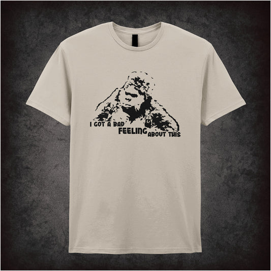 natural colour soft style unisex T-shirt featuring the quote "I Got a Bad Feeling About This" inspired by The Mighty Boosh, in bold, playful typography.