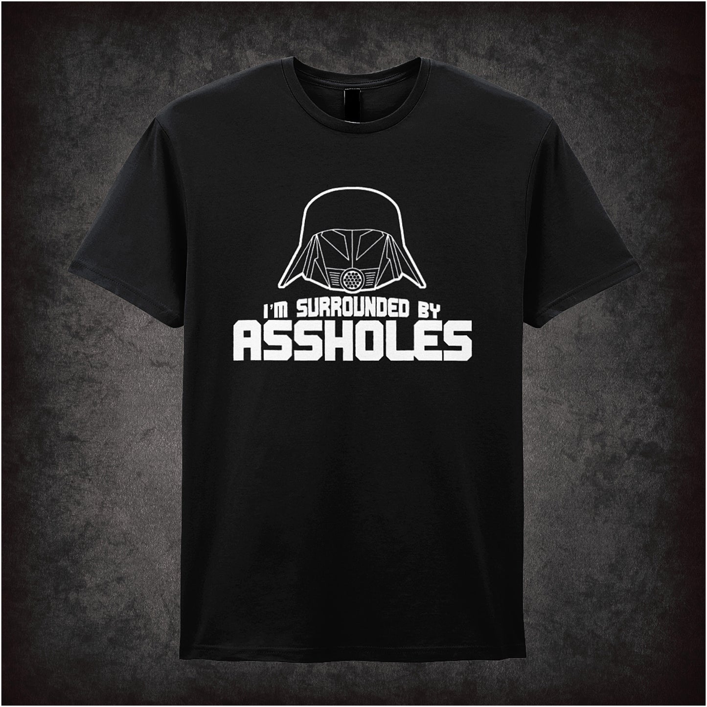 black unisex t-shirt featuring the phrase “I’m Surrounded By Assholes” in bold, humorous typography inspired by the movie Spaceballs.