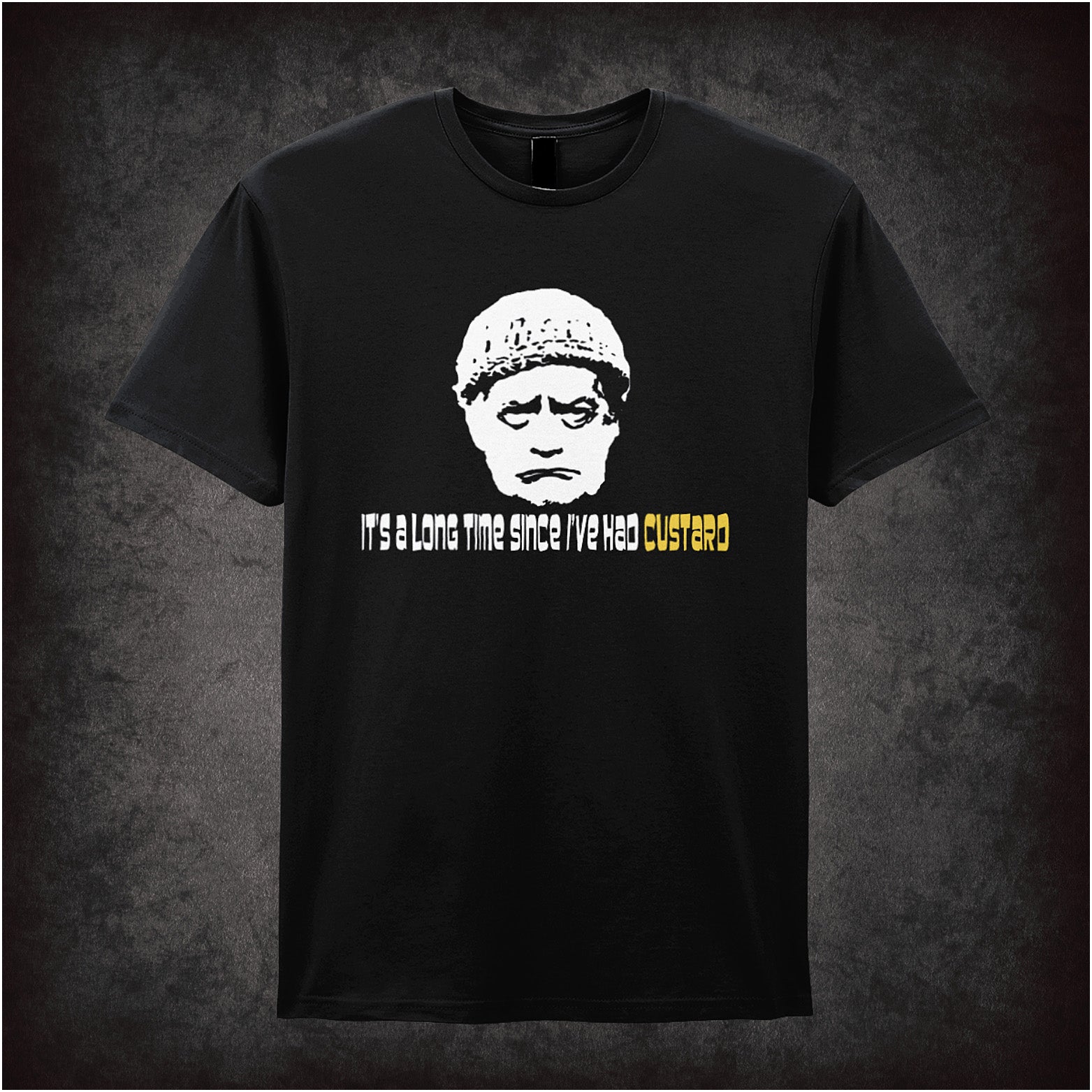 Black soft style unisex T-shirt featuring the quote "It's a Long Time Since I've Had Custard" inspired by The Last of the Summer Wine, in bold, nostalgic lettering.