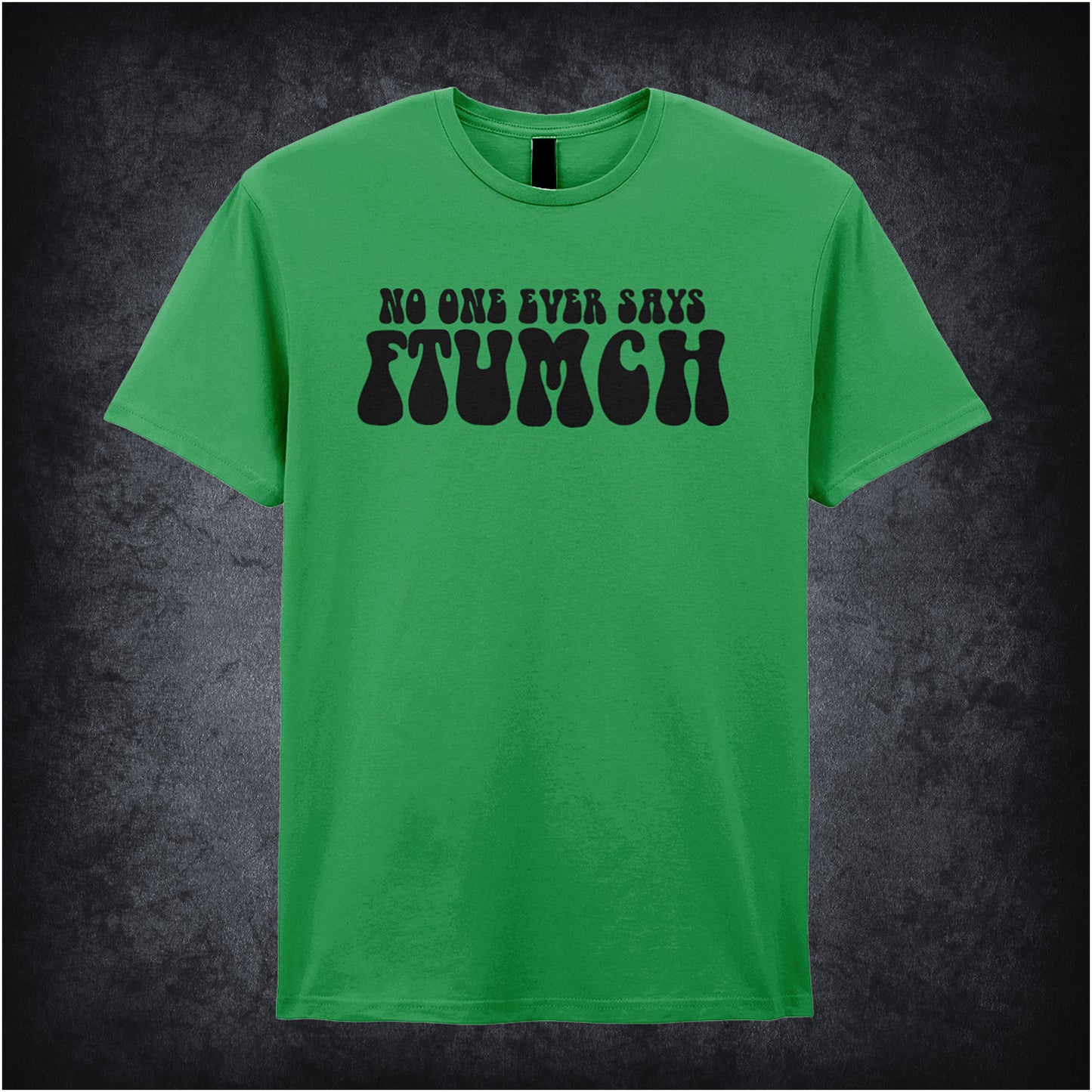 irish green unisex t-shirt featuring the phrase “No One Ever Says Ftumch” inspired by The Young Ones TV show, with playful, bold lettering.