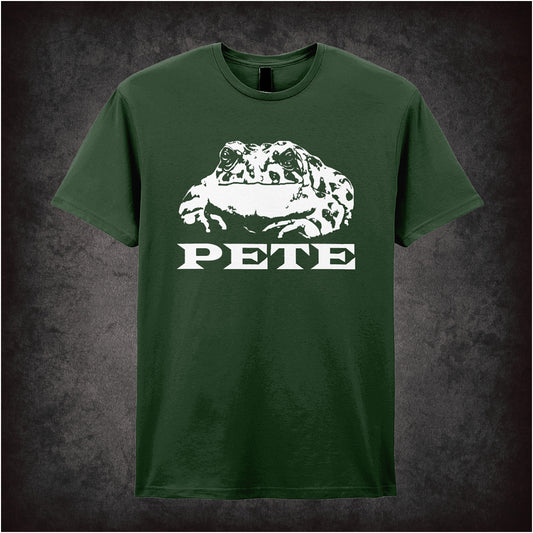 Forest green unisex t-shirt featuring a graphic of Pete transformed into a toad, inspired by the movie O Brother, Where Art Thou?, with stylized illustration and bold lettering.