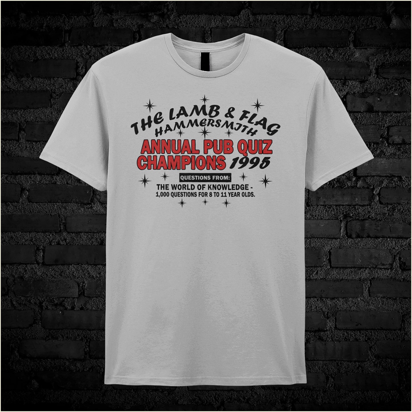 Sports grey unisex t-shirt featuring the text “The Lamb And Flag Hammersmith Annual Pub Quiz Champions 1995” inspired by the TV show Bottom, displayed in bold, vintage-style lettering.