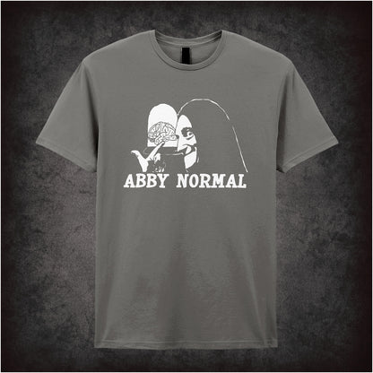 Abby Normal Young Frankenstein inspired soft style charcoal unisex T-shirt featuring iconic movie quote design, perfect for fans of classic comedy films.