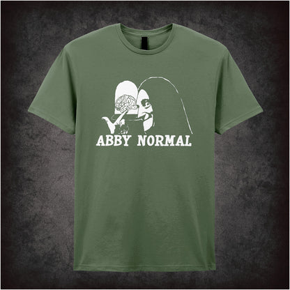 Abby Normal Young Frankenstein inspired soft style military green unisex T-shirt featuring iconic movie quote design, perfect for fans of classic comedy films.