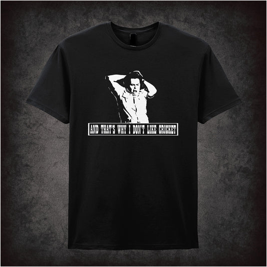 Black unisex T-shirt featuring the phrase "And That's Why I Don't Like Cricket" inspired by The Mighty Boosh, in bold, quirky typography.