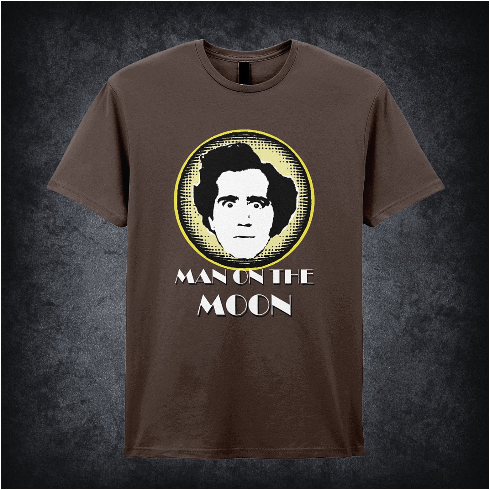 chocolate unisex T-shirt featuring “Andy Kaufman Man On The Moon” inspired design, with minimalist bold typography.
