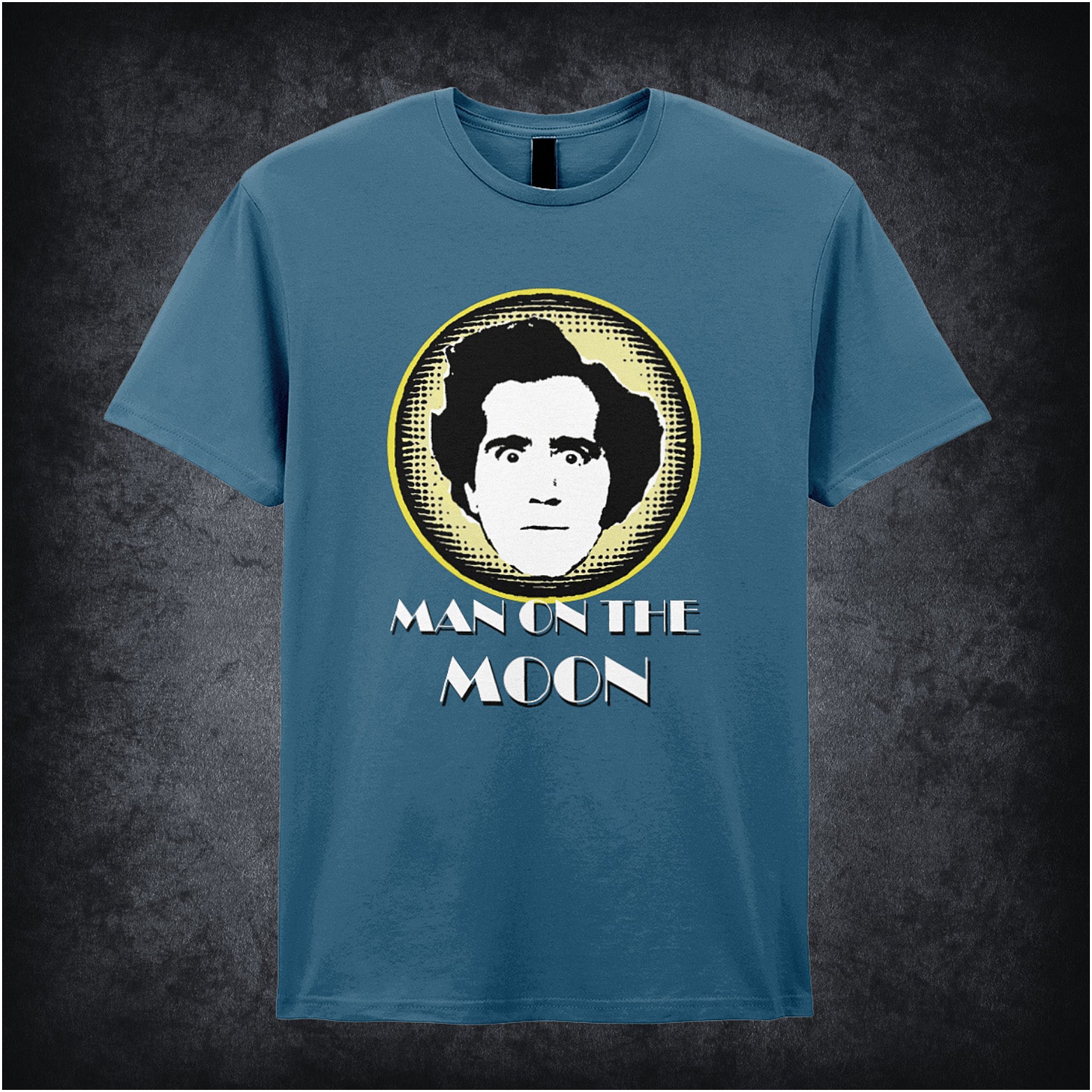 indigo unisex T-shirt featuring “Andy Kaufman Man On The Moon” inspired design, with minimalist bold typography.