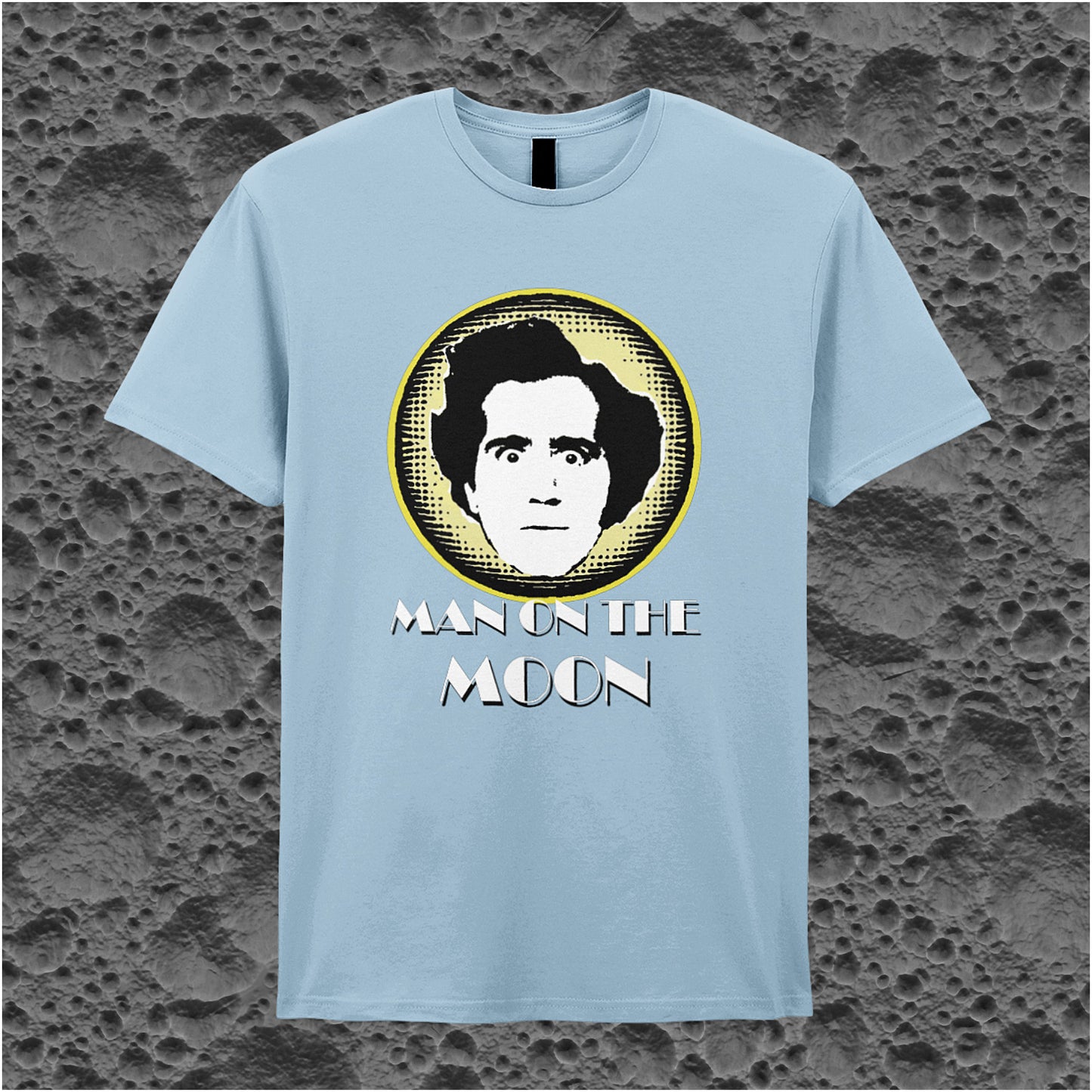 light blue unisex T-shirt featuring “Andy Kaufman Man On The Moon” inspired design, with minimalist bold typography.