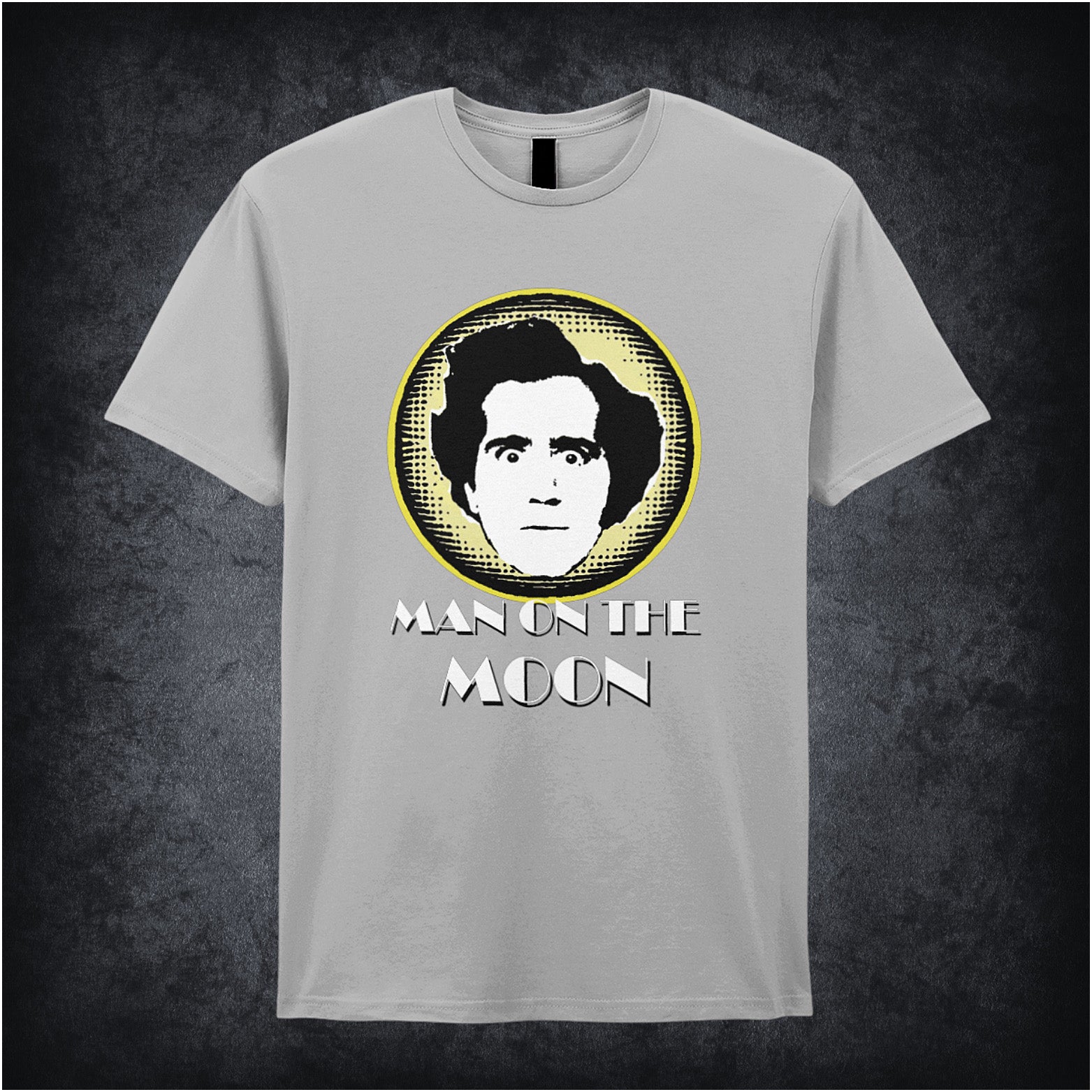 sports grey unisex T-shirt featuring “Andy Kaufman Man On The Moon” inspired design, with minimalist bold typography.
