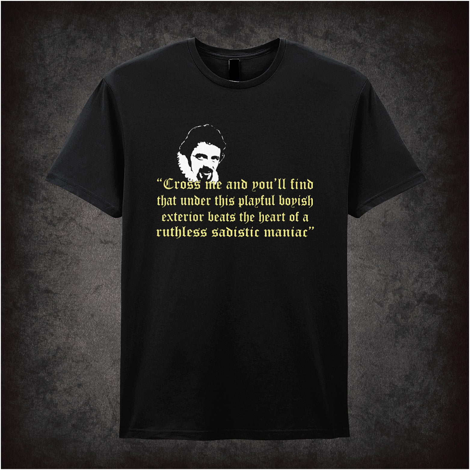 Black unisex T-shirt featuring the quote 'Cross Me And You'll Find That Under This Playful Boyish Exterior Beats The Heart Of A Ruthless Sadistic Maniac' from Blackadder in yellow text.
