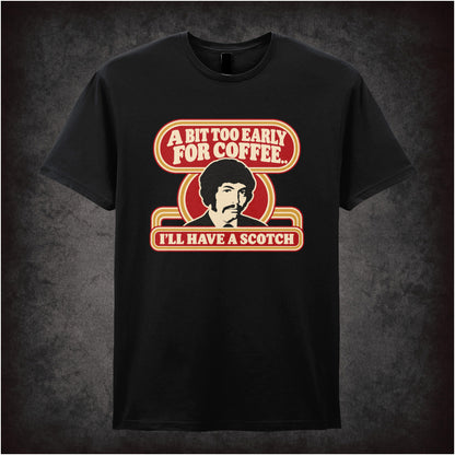 “Jason King ‘A bit too early for coffee… I’ll have a scotch’ T-shirt in black from Department S (Jason King)”