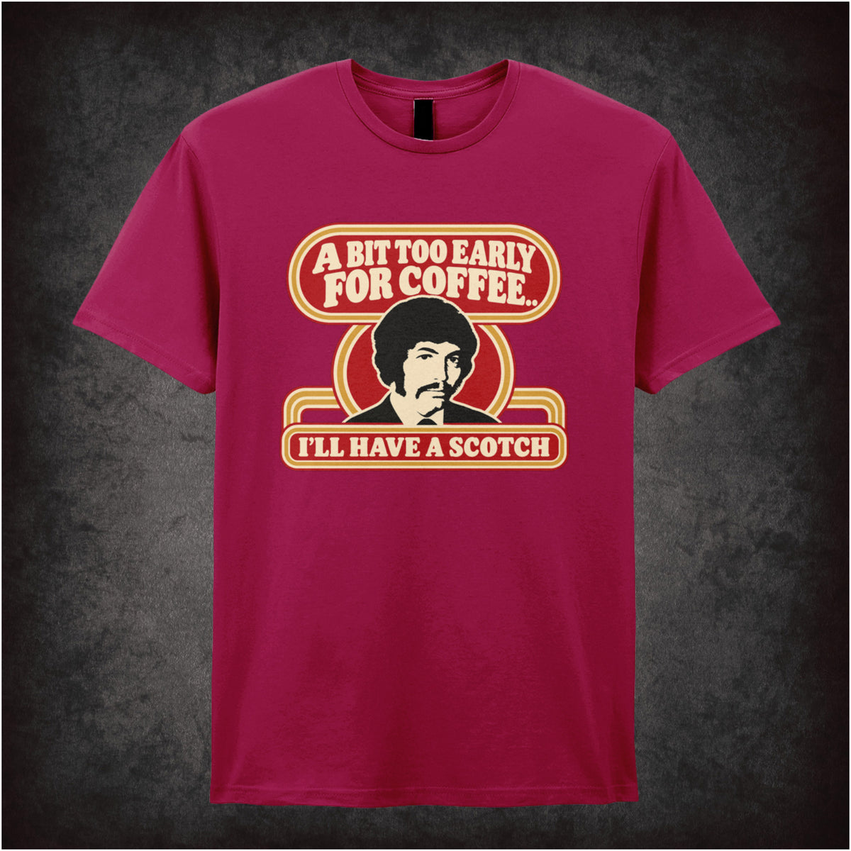 “Jason King ‘A bit too early for coffee… I’ll have a scotch’ T-shirt in cardinal red from Department S (Jason King)”