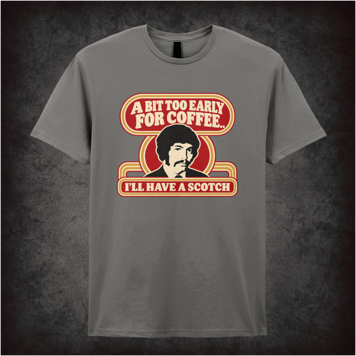 “Jason King ‘A bit too early for coffee… I’ll have a scotch’ T-shirt in charcoal from Department S (Jason King)”