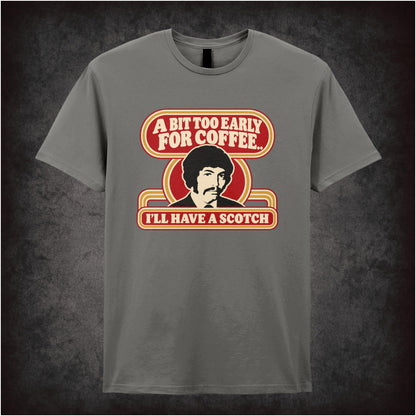 “Jason King ‘A bit too early for coffee… I’ll have a scotch’ T-shirt in charcoal from Department S (Jason King)”