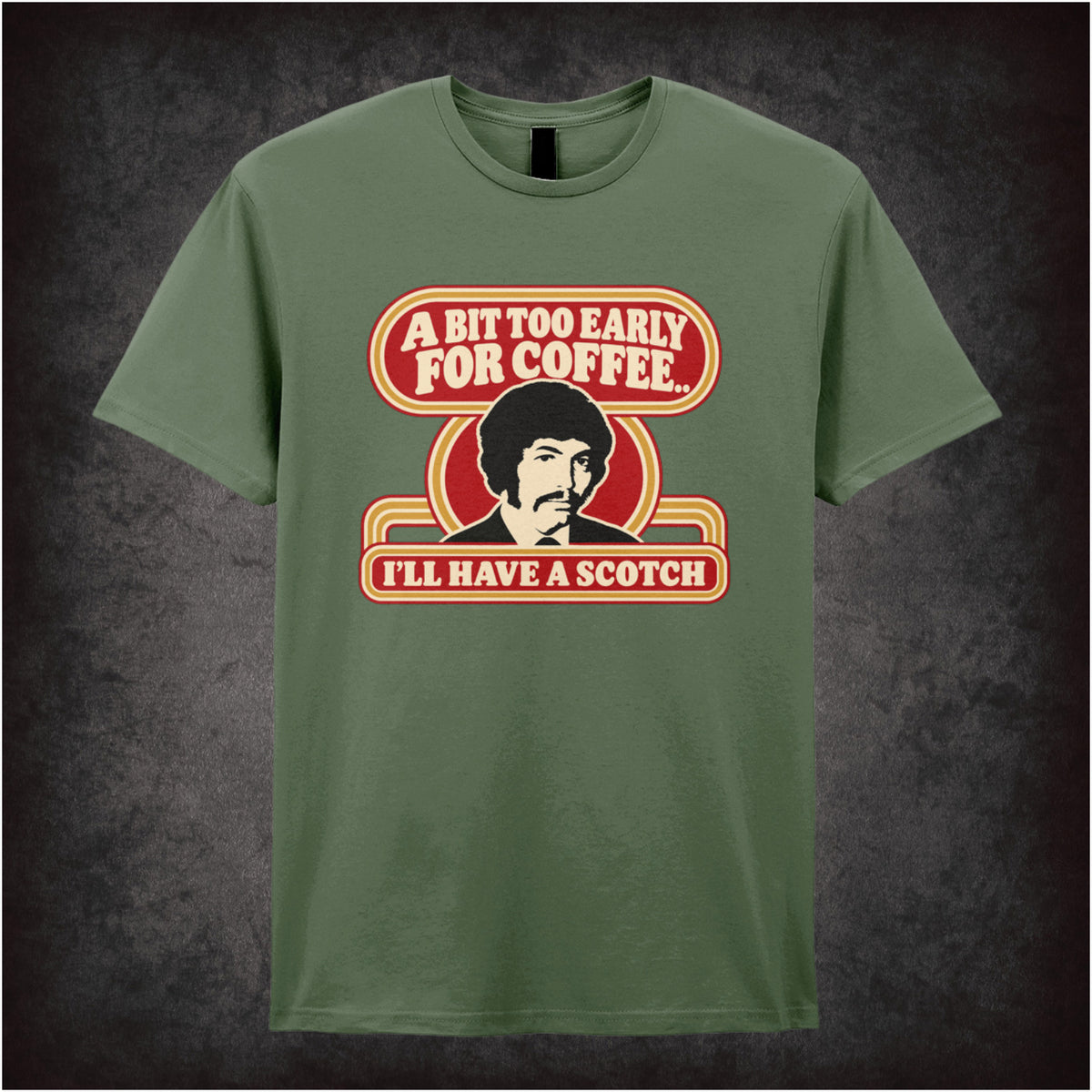 “Jason King ‘A bit too early for coffee… I’ll have a scotch’ T-shirt in military green from Department S (Jason King)”