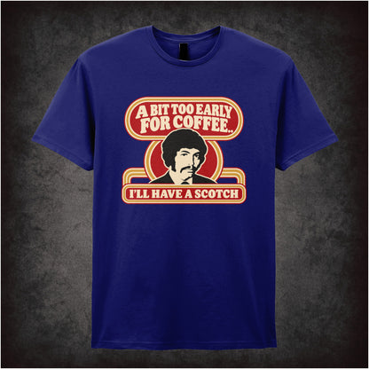 “Jason King ‘A bit too early for coffee… I’ll have a scotch’ T-shirt in navy from Department S (Jason King)”