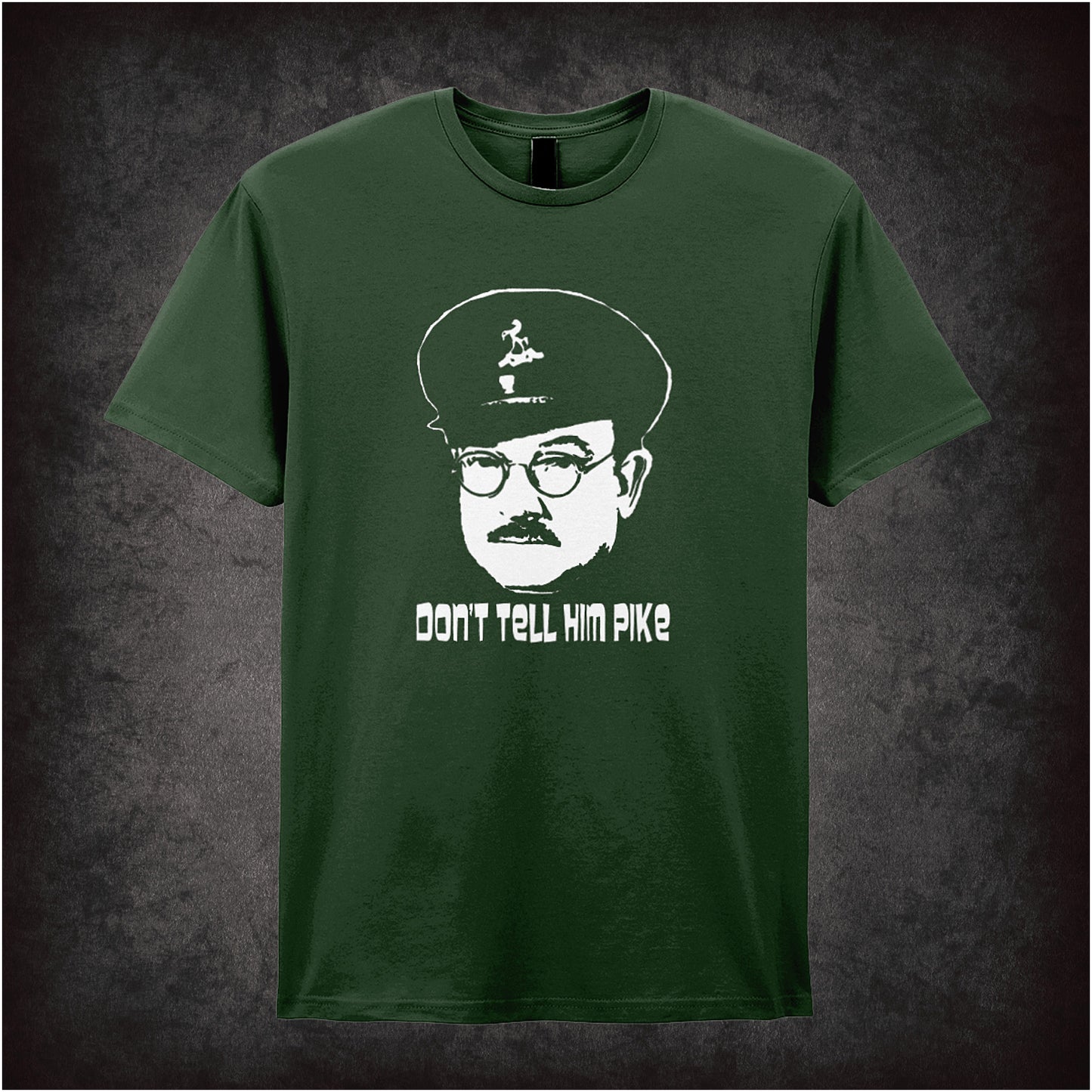 forest Soft style unisex T-shirt featuring the phrase "Don't Tell Him Pike" inspired by Dad's Army, printed in bold, classic British comedy lettering.