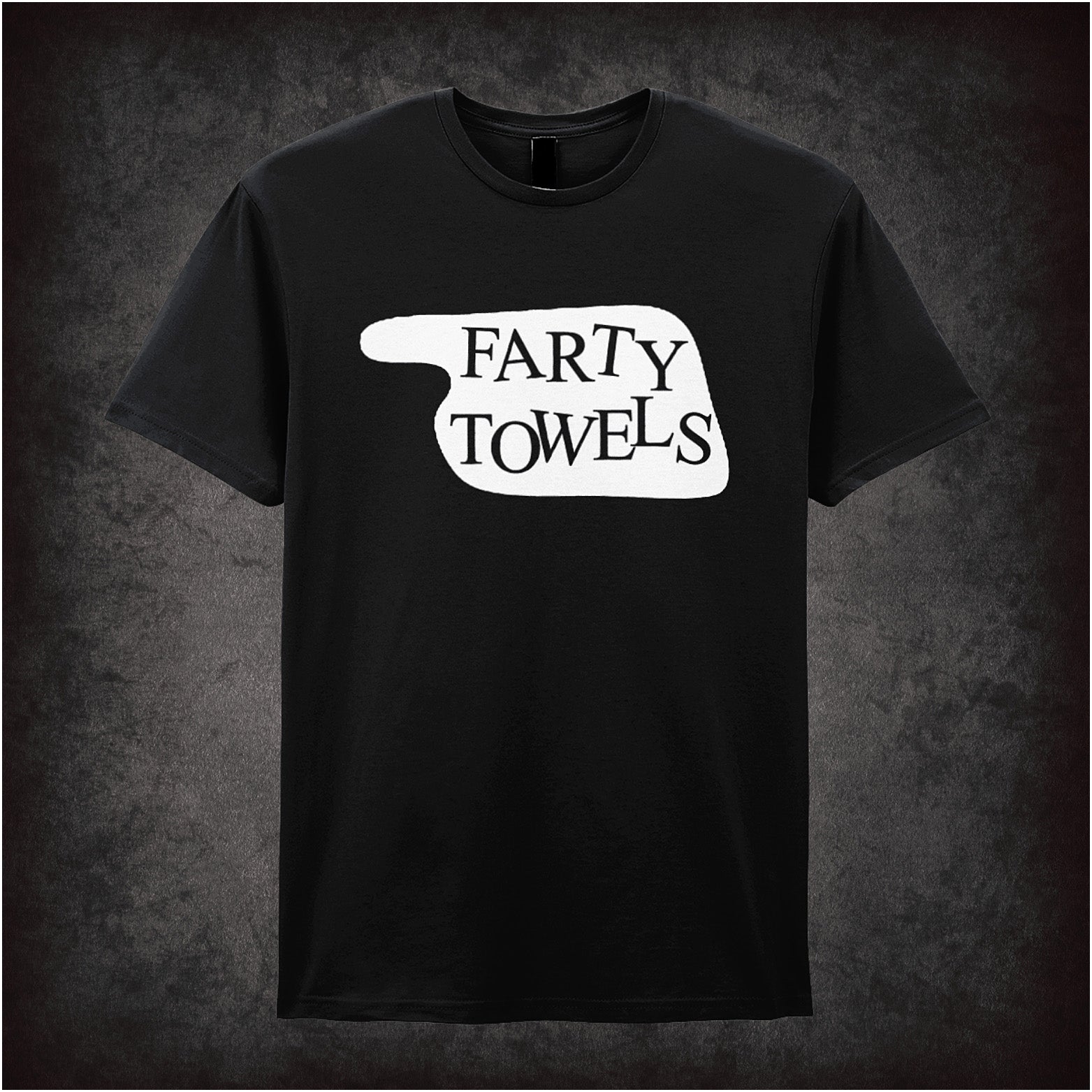 black Soft style unisex T-shirt featuring a parody hotel sign reading "Farty Towels," inspired by Fawlty Towers, with a playful bold graphic design.