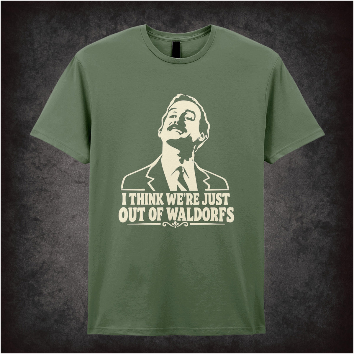 “Basil Fawlty ‘I think we’re just out of Waldorfs’ T-shirt in military green from Fawlty Towers”