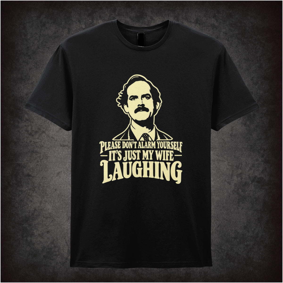 'Please don't alarm yourself it's just my wife laughing' T-shirt in black from Fawlty Towers
