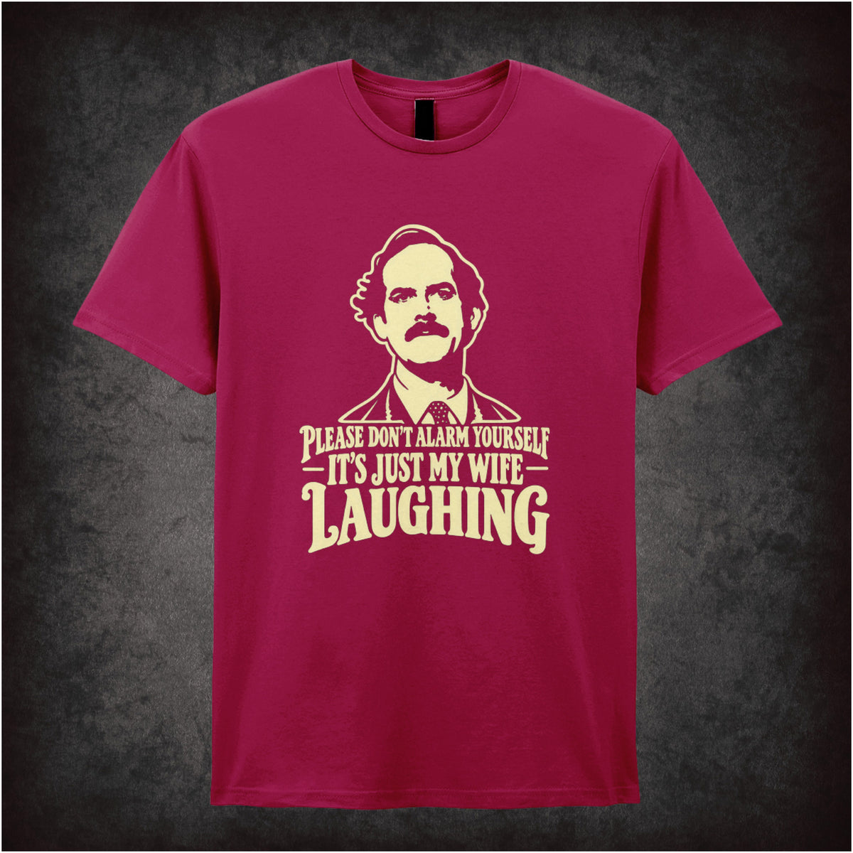 'Please don't alarm yourself it's just my wife laughing' T-shirt in cardinal red from Fawlty Towers
