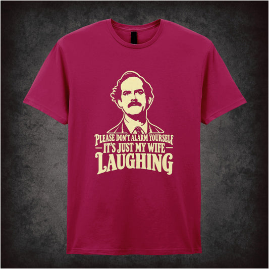 'Please don't alarm yourself it's just my wife laughing' T-shirt in cardinal red from Fawlty Towers