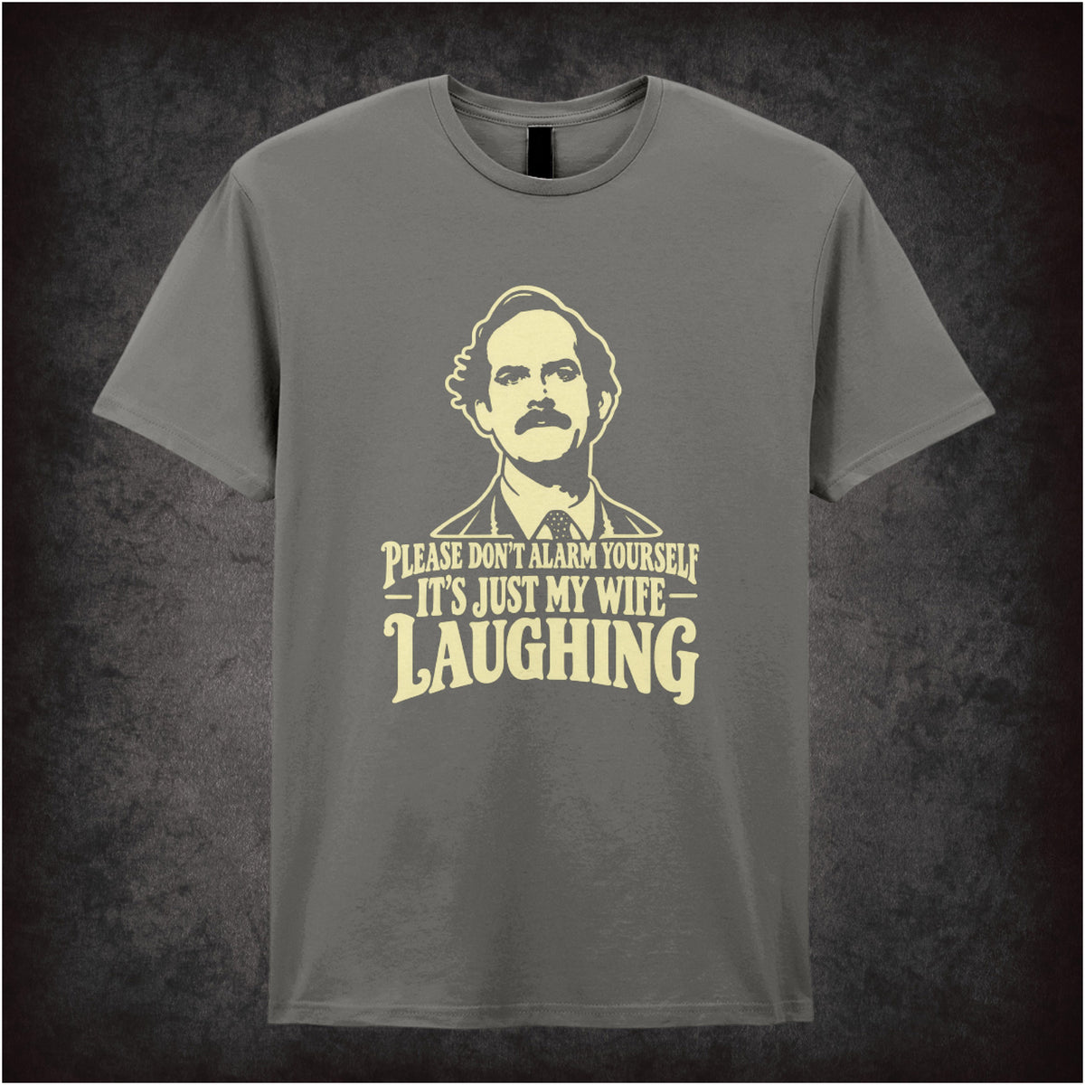 'Please don't alarm yourself it's just my wife laughing' T-shirt in charcoal from Fawlty Towers
