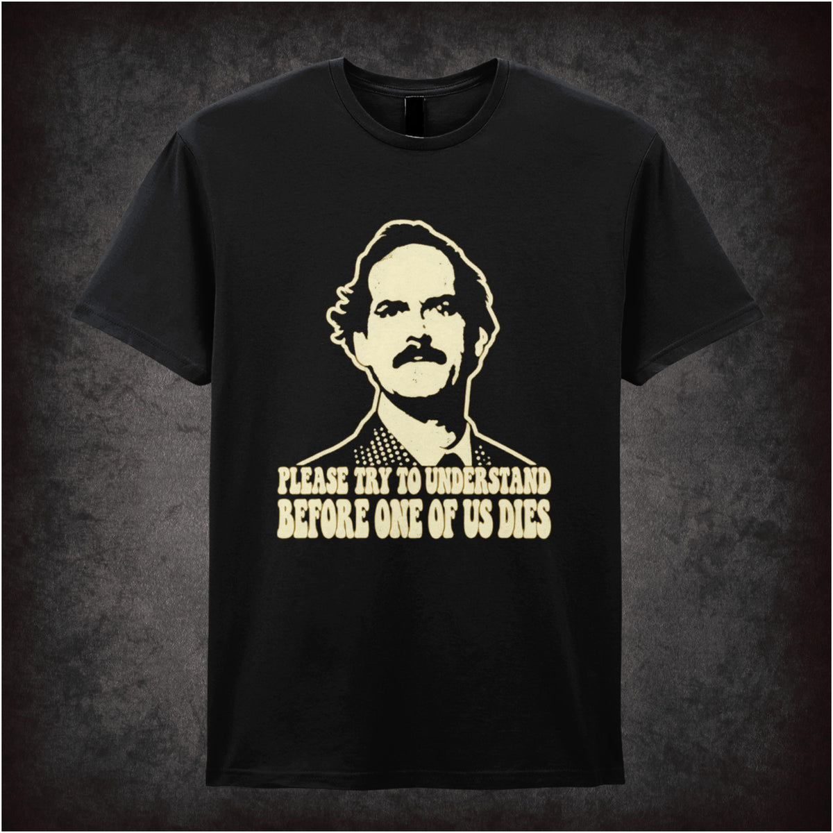 “Basil Fawlty ‘Please try to understand before one of us dies’ T-shirt in black from Fawlty Towers”
