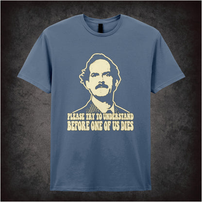 “Basil Fawlty ‘Please try to understand before one of us dies’ T-shirt in indigo from Fawlty Towers”
