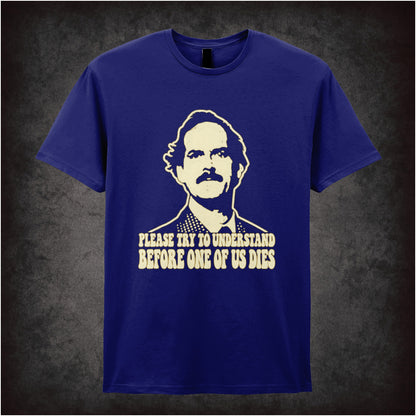 “Basil Fawlty ‘Please try to understand before one of us dies’ T-shirt in navy from Fawlty Towers”