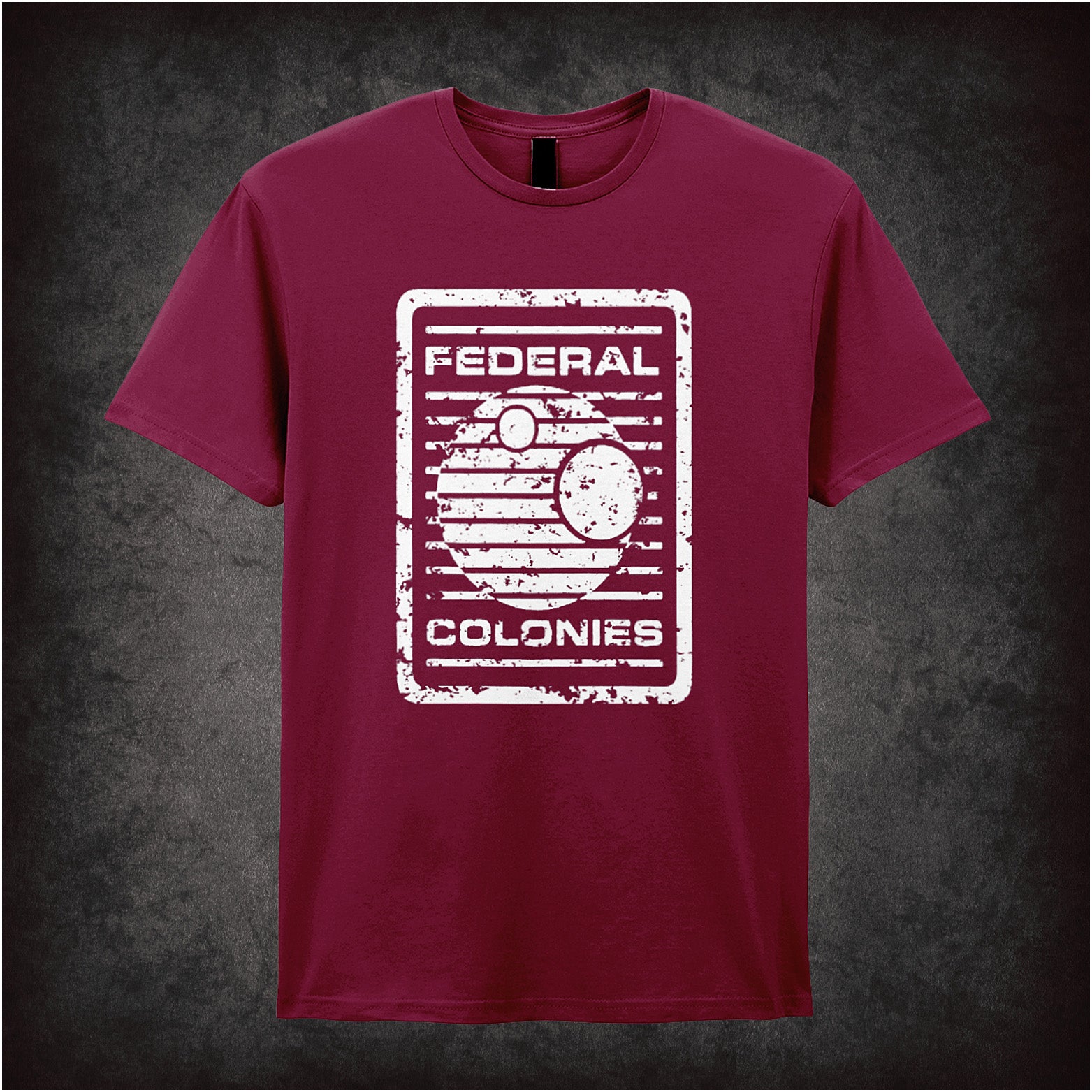 Federal Colonies – Total Recall-inspired design featuring a retro-futuristic space travel poster with bold text and planet imagery, printed on a cardinal red unisex t-shirt.