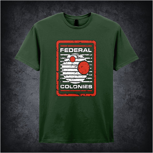 Federal Colonies – Total Recall-inspired design featuring a retro-futuristic space travel poster with bold text and planet imagery, printed on a forest unisex t-shirt.