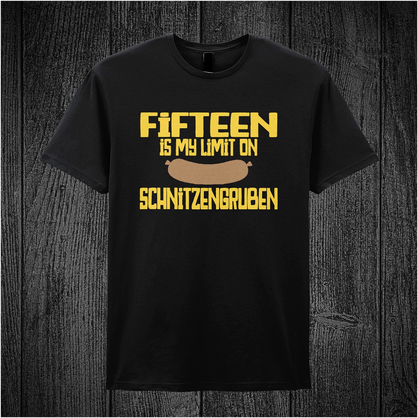 black unisex t-shirt featuring the phrase “Fifteen Is My Limit On Schnitzengruben” in bold lettering, referencing the movie Blazing Saddles.