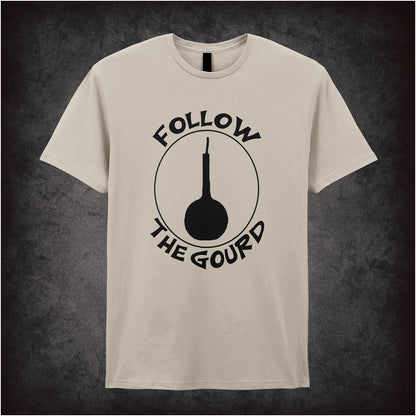 Follow the Gourd Monty Python Life of Brian inspired soft style unisex sand T-shirt featuring iconic movie quote design, perfect for classic comedy fans.