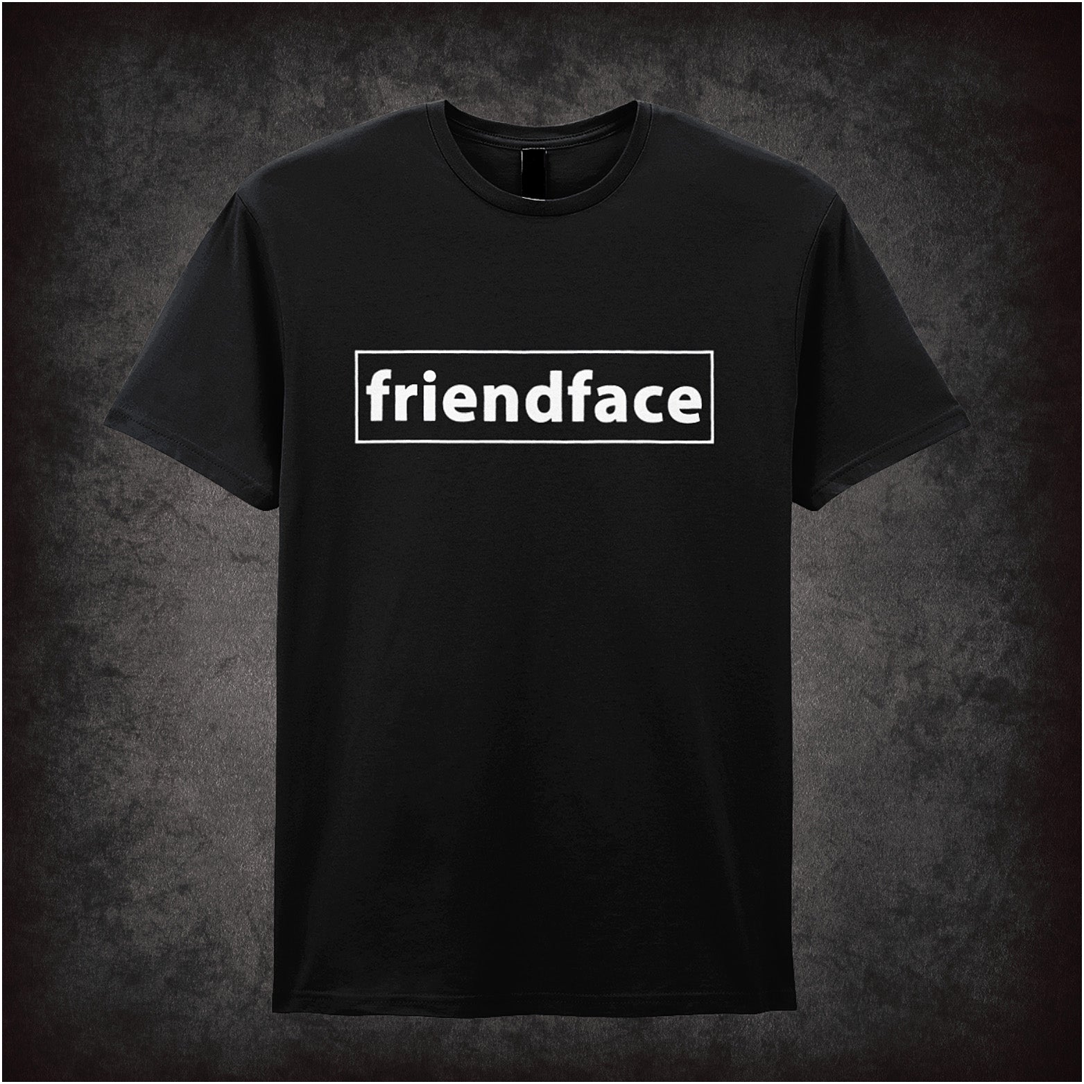 black unisex T-shirt featuring the “Friendface” logo inspired by The IT Crowd, designed in a parody social media style with bold, tech-inspired lettering.