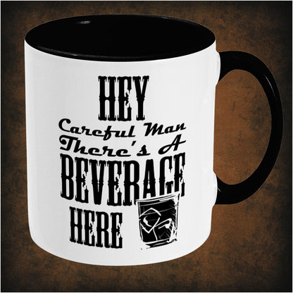 Hey, careful man, there’s a beverage here’ two-toned mug inspired by The Big Lebowski, right hand side featuring iconic movie quote, minimalist design, and pop culture collectible style.
