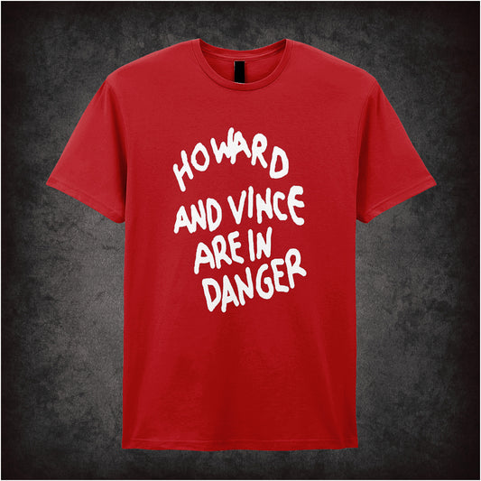 red unisex T-shirt featuring “Howard And Vince Are In Danger” design inspired by The Mighty Boosh, with bold, quirky typography.