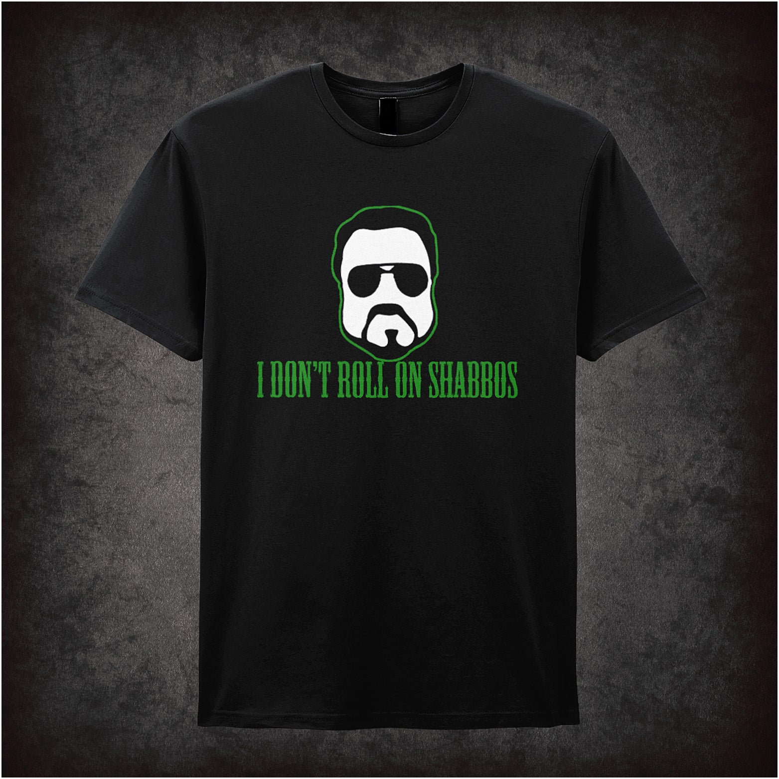 Black unisex T-shirt featuring the phrase "I Don't Roll On Shabbos" inspired by The Big Lebowski, with bold, retro-style typography.