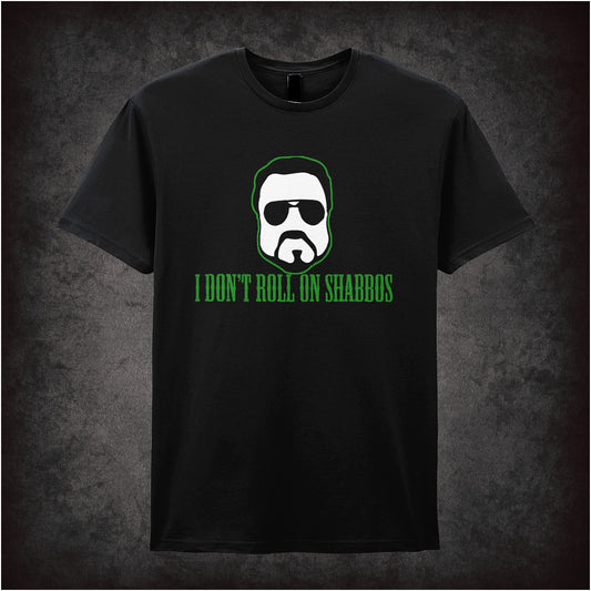 Black unisex T-shirt featuring the phrase "I Don't Roll On Shabbos" inspired by The Big Lebowski, with bold, retro-style typography.