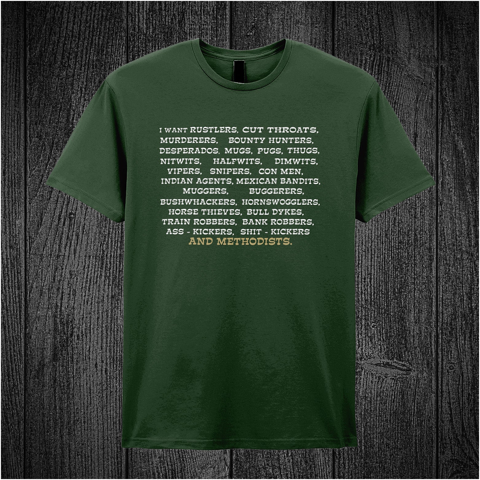 forest unisex T-shirt featuring the quote “I Want Rustlers, Cutthroats, Murderers, Bounty Hunters...” inspired by Blazing Saddles, displayed in bold western-style lettering.