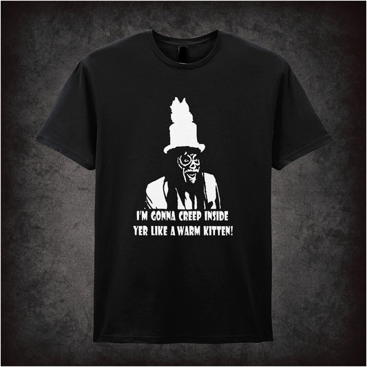 Black soft style unisex T-shirt featuring the quote "I'm Gonna Creep Inside Yer Like a Warm Kitten" inspired by The Mighty Boosh, in bold playful lettering.
